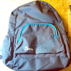 Adidas blue backpack.